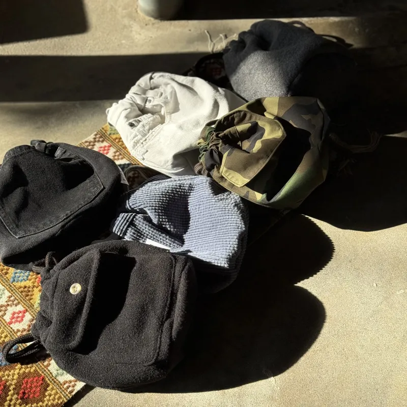 「REMAKE PERSONAL BAGS」古着を生地に戻して再構築したバック。USミリタリーのバックをサンプリング