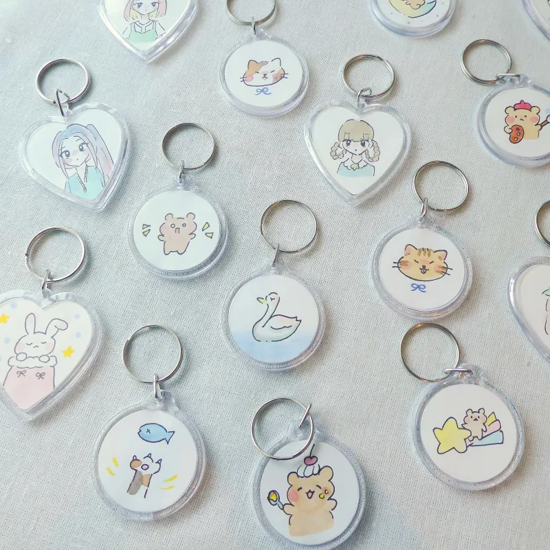 新登場！「おえかきーほるだー」 日々量産される少し気の抜けたコナのお絵かきたちをキーホルダーにしてみました。
