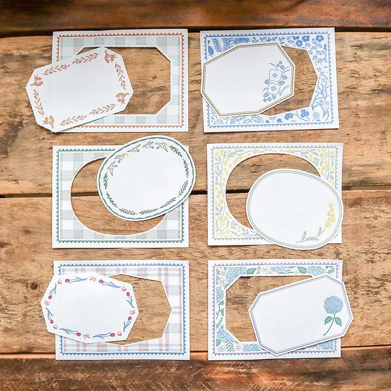 白い雪がきらめく紙に降り積もる、長い冬を耐え春を待つ北の馬たちの雪の日の静かな時間を切り取ったカード「北の馬」