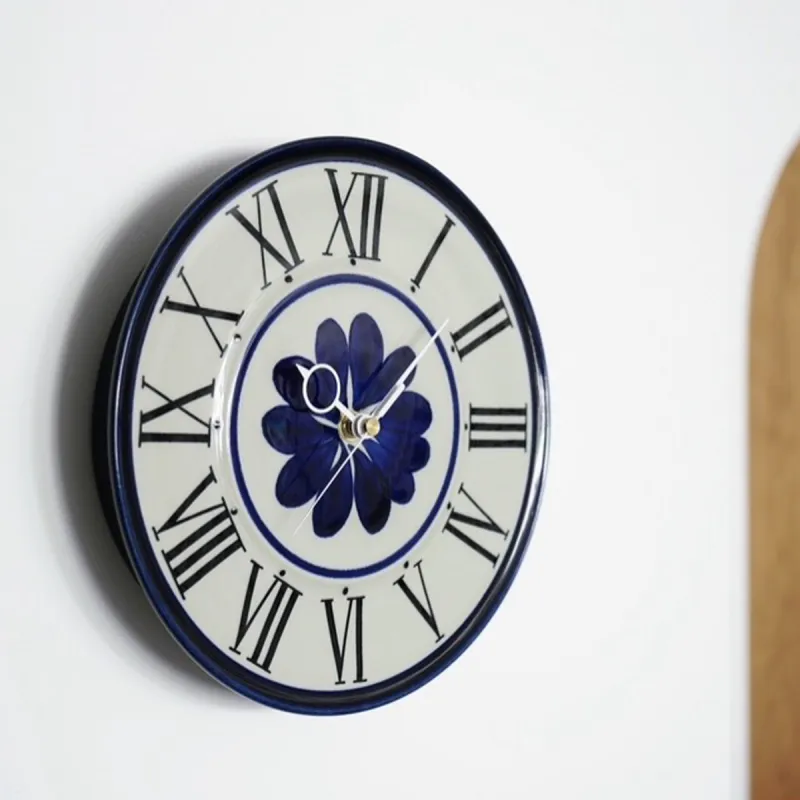 スウェーデン「Rorstrand」で1969年にMarianne Westmanによりデザインされた陶製壁掛け時計