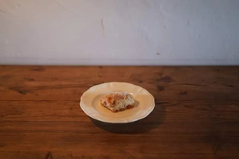 「りんごとくるみのリュスティック」焦がしバターで和えたりんごとくるみが入った、リュスティック。