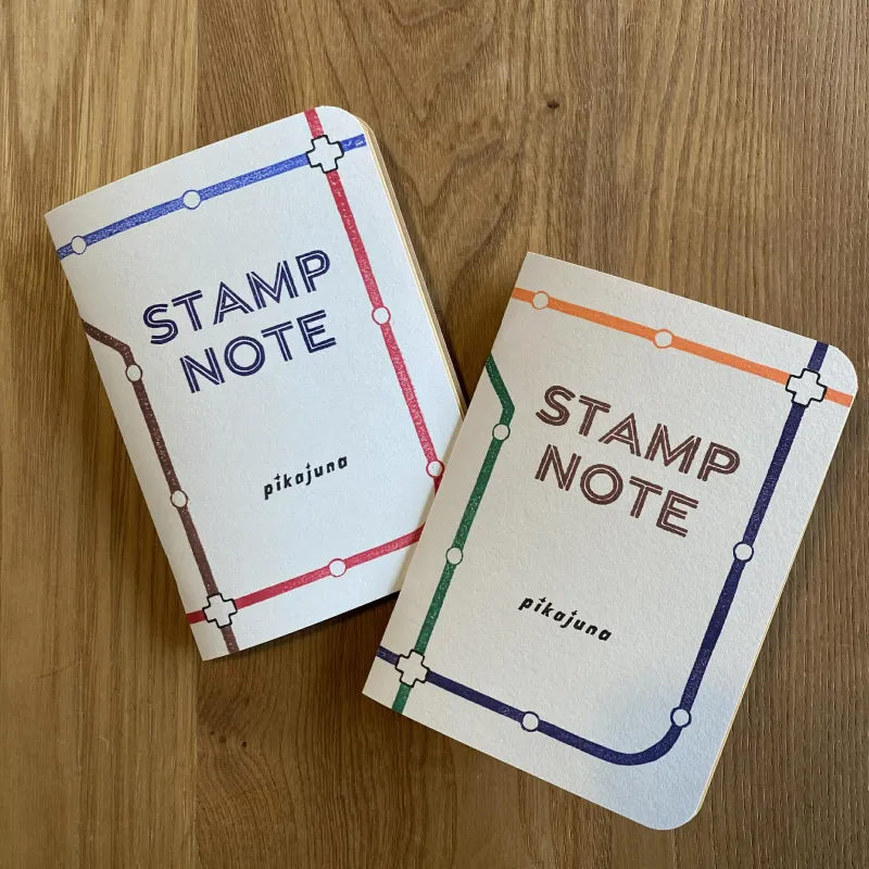 表紙に消しゴムはんこで作った文字を押した手作りスタンプノート。ピカユナ製作所ブース内購入者特典スタンプを押すのにいかが？