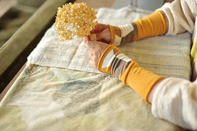 ふんわりくつしたと同じつくりで、一度手にはめると外せなくなる心地よさの「ふんわりウォーマー」